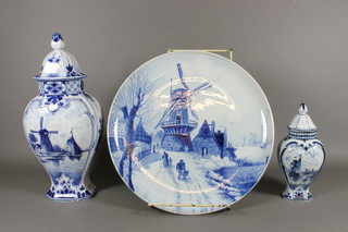 A 20th Century Dutch Delft urn and cover decorated windmills  13" and other items of Delft