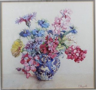 E Hogarth, 20th Century School, watercolour on paper, still life  study of flowers in a blue and white vase, signed 12.5"h x  13.25"w together with a companion piece, still life 12.5" x  13.25"w