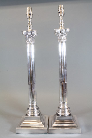A handsome pair of silver plated Corinthian column table lamps on square stepped  bases 24"h