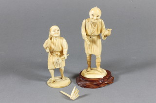 A 19th Century Japanese carved ivory Okimono of a standing  man with bird 4.5", base signed and 1 other of a gardener, the  base with red seal mark