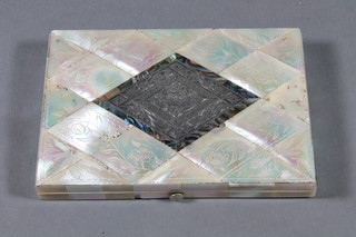 A carved mother of pearl card case, 2 sections missing
