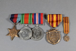A group of 4 medals comprising 1939-45 Star, Defence and War  medal and Dunkirk medal together with a Dunkirk miniature  metal
