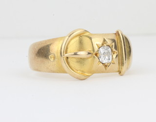 A Victorian 18ct yellow gold buckle dress ring set a diamond