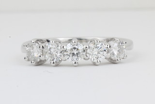 A lady's 18ct white gold dress ring set 5 diamonds, approx  0.83ct