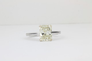 A lady's 18ct white gold engagement/dress ring set a rectangular princess cut solitaire diamond approx 2.51ct