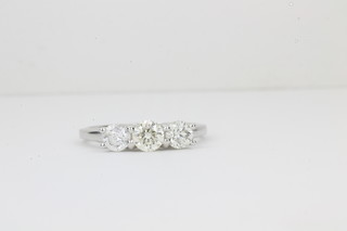 A lady's 18ct 3 stone diamond dress ring approx 1.16ct