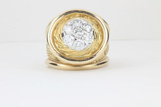 Kutchinsky, a gentleman's stylish 18ct gold dress ring set 7 diamonds, approx 1.4ct in total  ILLUSTRATED