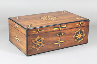 A late Victorian figured walnut and parcel ebonised work box, having geometric parquetry decoration, the hinged top enclosing  a removable fitted tray, 4.75"h x 12"w x 7.5"d