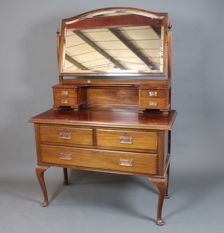 A late Victorian mahogany dressing chest, having an arch topped bevelled plate mirror above 4 small drawers with a further 3  drawers below, raised on cabriole legs, pad feet 66"h x 45"w x  22"d