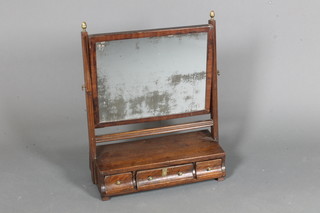 A George III mahogany toilet mirror, having a rectangular plate  with reeded supports, raised on a box base fitted with 3 small  drawers 23"h x 19"w x 9"d