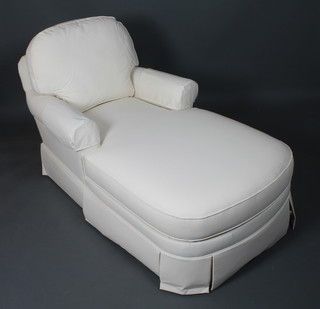 Ethan Allen, USA. A modern day bed, having scrolled arms and  cream canvas upholstery, raised on turned tapered legs 60"l