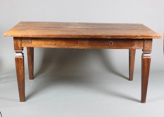 An 18th Century French style stained beech wood and oak farm  house kitchen table fitted 2 short drawers, raised on carved  tapered legs 31"h x 36"w x 63"l