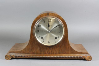 Mappin & Webb. A 1920's oak mantel clock having Arabic  silvered dial, set 8 day movement signed Wurttenberg, chiming  gongs
