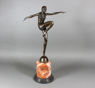 An Art Deco style bronze figure of a dancing lady, raised on a turned marble base 23"h