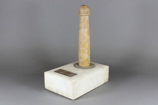 A carved stone phallus, bears mark 15th Century BC, together  with certificate, 11", on a marble base