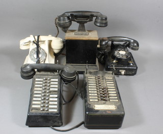 A white Bakelite telephone, a Belgian telephone and 1 other
