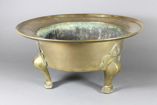 An early 20th Century Chinese bronze jardiniere, raised on 3 panel supports decorated storks 16"diam.