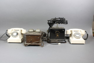 2 white Bakelite telephones together with an Ericsson telephone and a wall mounting telephone