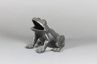 A 19th Century cast iron figure of a seated toad 5", probably  removed from a Sussex Toad in the Hole game,