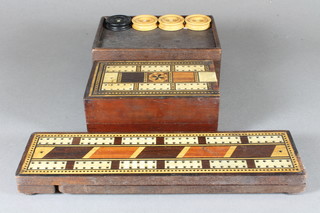 A turned wooden draughts set and 2 wooden cribbage boards