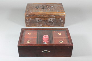 A late 19th Century Bavarian carved beechwood work box together with a cased bridge set