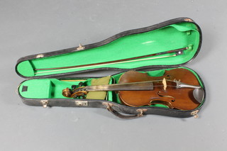 A violin, labelled Made in Nippon, with 2 piece back 14.5"  complete with bow and fibre case