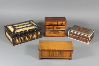A Ceylonese porcupine quill box 8", a carved Indian box  decorated The Taj Mahal, a parquetry box and a miniature coffer