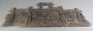 A Bavarian heavily carved relief oak panel of 3 section depicting hunting scenes 66" x 28"