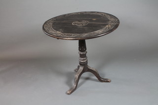 A mid 18th Century oak tilt top tea table, having later foliate carved top and tripod base, 31"diam. x 29.5"h