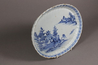 An early 19th Century Chinese oval blue and white dish  decorated Pagodas 9"