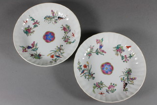 A pair of 19th Century Chinese circular porcelain dishes with floral decoration 6"
