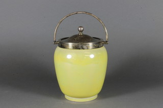 A Moorcroft yellow glazed biscuit barrel with silver plated mounts 6" ILLUSTRATED