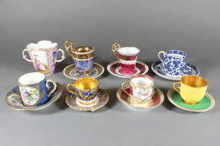 A Meissen style twin handled cup with panel decoration, a yellow glazed Worcester cabinet cup and saucer, a Coalport do. and a  collection of other cabinet cups and saucers