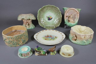 A Sylvac green glazed wall pocket decorated a rabbit, reverse impressed 323 6", do. circular bowl 7", do. bowl in the form of  a tree stump with rabbit 7", circular bowl decorated fruit, 2 egg  cups, a vase in the form of a tree stump, a Royal Albert  Bunnykins plate, a Beswick figure of a bird 2" and 1 other figure  of a bird