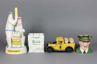 A Sylvac Schweppes advertising figure in the form of a batsman at crease 10", a Sylvac Harrods tea caddy, do. bag and a  Sandeman's Port pottery model of a delivery van