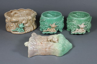 A pair of Sylvac circular green glazed vases in the form of tree  stumps decorated pixies 5", do. bowl 7" and a wall pocket