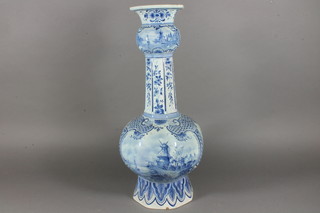 A Delft club shaped vase decorated windmills, chips to base, 22" ILLUSTRATED