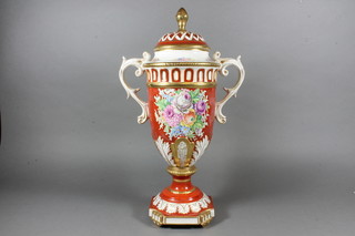 An Italian porcelain twin handled urn and cover 19"