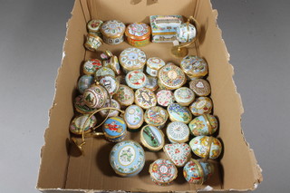 A large and comprehensive collection of limited edition Halcyon  Days enamelled trinket boxes