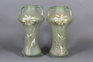 A pair of Japanese pottery twin handled vases with floral decoration 12"