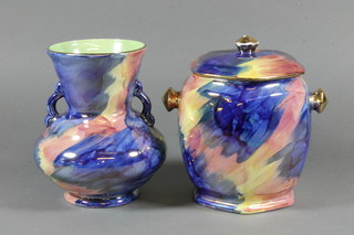 A Malingware blue and pink lustre twin handled vase 6" and a  do. biscuit barrel