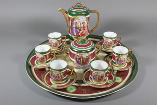 An Austrian porcelain 15 piece cabaret set comprising circular tray, coffee pot, sugar bowl, 6 cups and 6 saucers