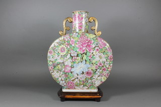 A 20th Century Chinese twin handled moon flask with  Millefiouri decoration 12"