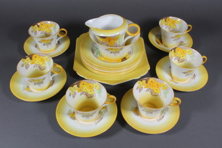 A Shelley Phlox pattern 21 piece tea service comprising twin  handled plate 8.5", 6 tea plates 7", sugar bowl - cracked, cream  jug, 6 cups and 6 saucers - 1 cup cracked and chipped