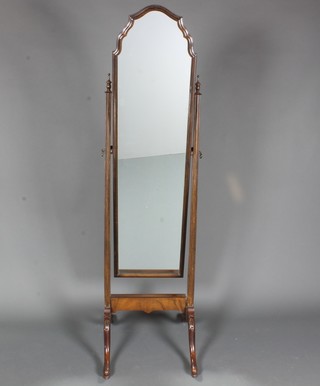 A Queen Anne style walnut cheval mirror, having a moulded  frame raised on splayed legs, slipper feet 62"h x 17"w