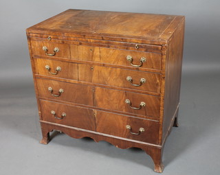 A late George III mahogany bachelor's chest, crossbanded and boxwood line inlaid, fitted brushing slide above 4 graduated long  drawers, raised on splayed feet 34"h x 35"w x 23.5"d