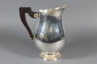 A silver plated lemonade jug of baluster form by Christophel