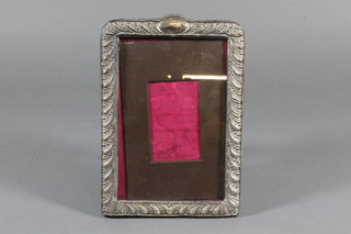 An embossed silver easel photograph frame Birmingham 1903,  6.5" x 4.5"
