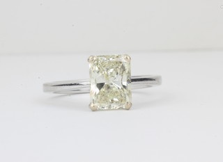 A lady's 18ct white gold engagement/dress ring set a rectangular princess cut solitaire diamond approx 2.51ct