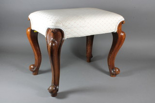 A mid 19th Century French walnut dressing stool, having  tapestry woven stuff over seat, raised on cabriole legs, scroll feet  16"h x 18"w x 13"d